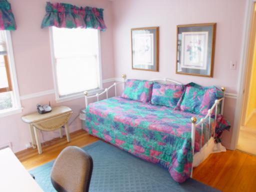 741 Braeburn Road Inverness, IL 60067 - Photo 8 of 10 a bedroom with a bed and window