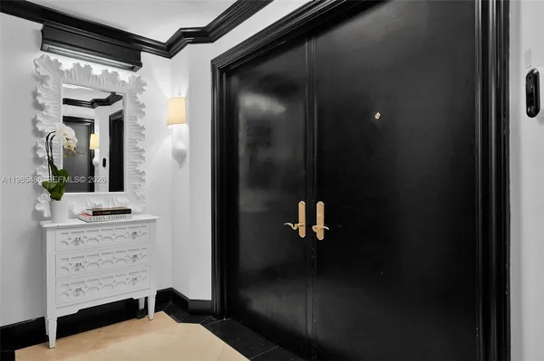 a bathroom with a shower and a sink