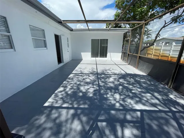 a view of a back yard of the house