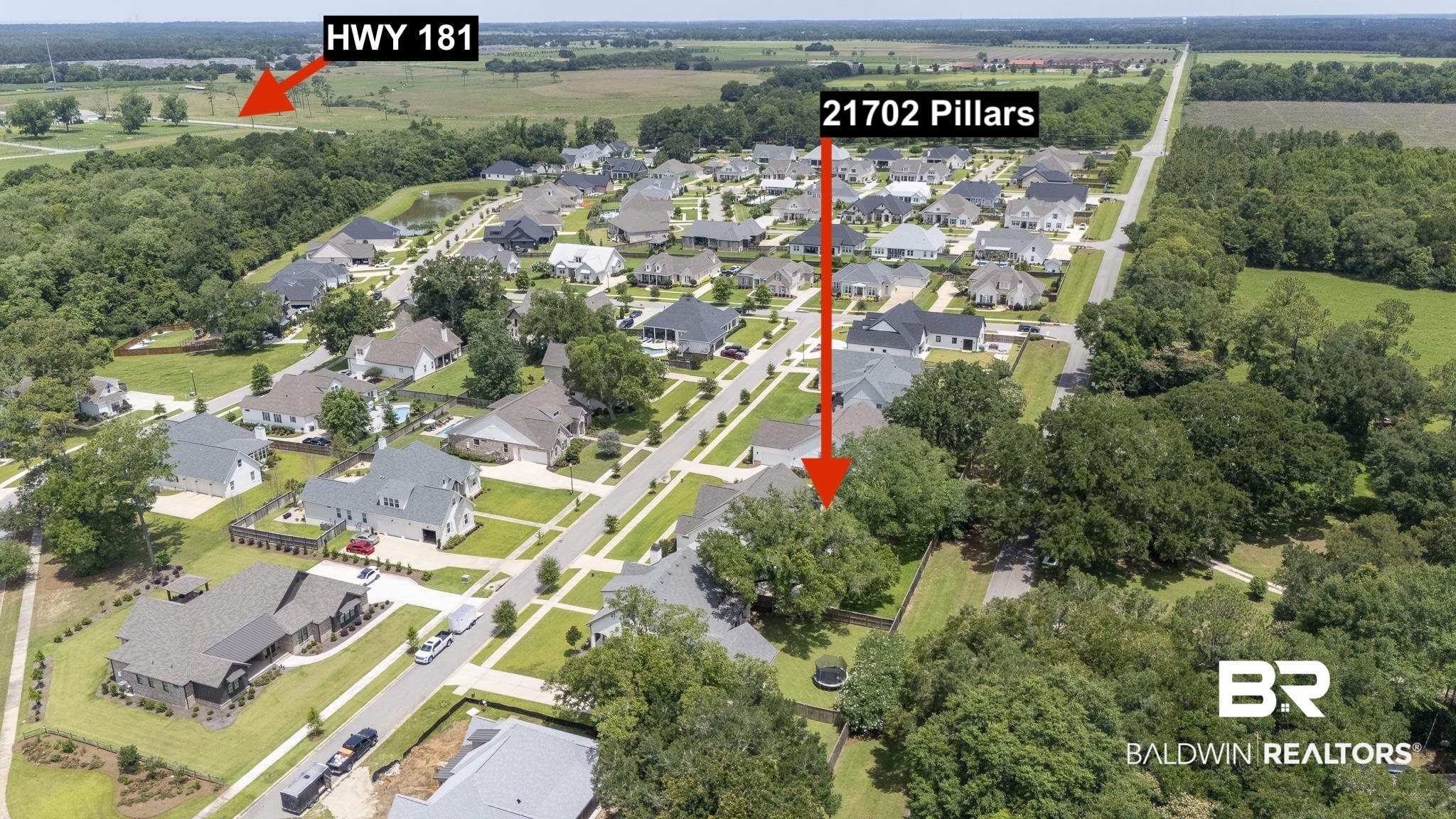 21702 Pillars Street Fairhope, AL 36532 - Photo 50 of 54 Aerial overview of a residential development featuring single-family homes on individual lots
