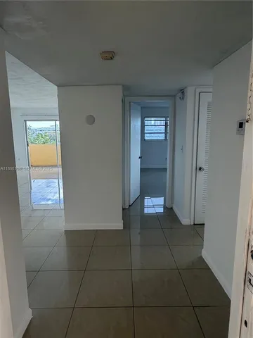 a view of a closet area in a room