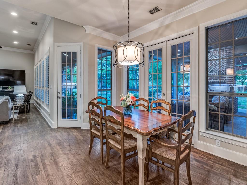 701 Regency Court Denton, TX 76210 - Photo 14 of 39 a view of a dining room with furniture window and wooden floor