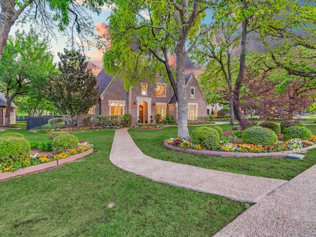 701 Regency Court Denton, TX 76210 - Photo 3 of 39 front view of a house with a yard