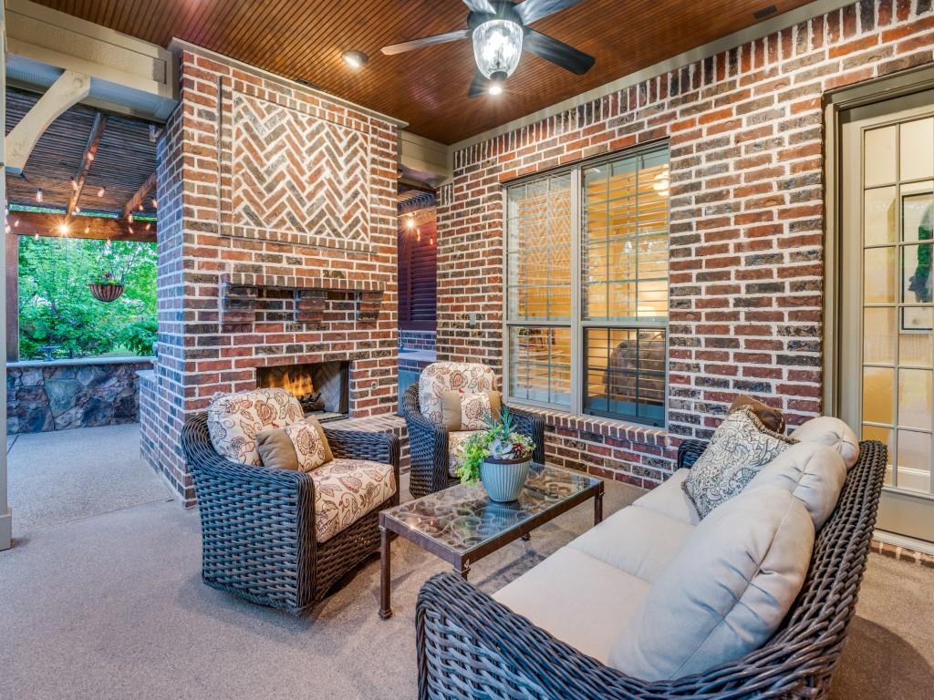 701 Regency Court Denton, TX 76210 - Photo 31 of 39 a outdoor living space with furniture and a potted plant
