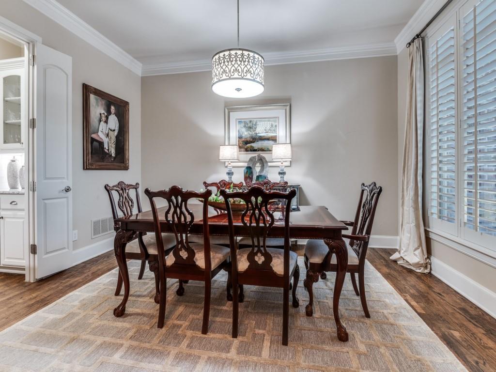 701 Regency Court Denton, TX 76210 - Photo 8 of 39 a view of a dining room with furniture window and wooden floor