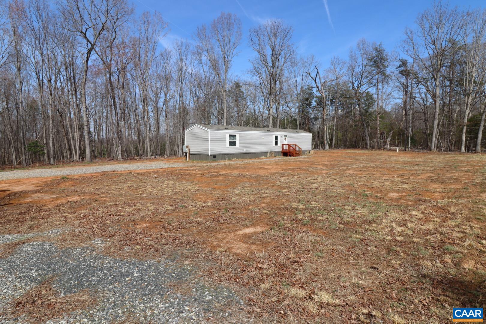 169 Old Darbytown Road Dillwyn, VA 23936 - Photo 16 of 16 Level yard and parking area