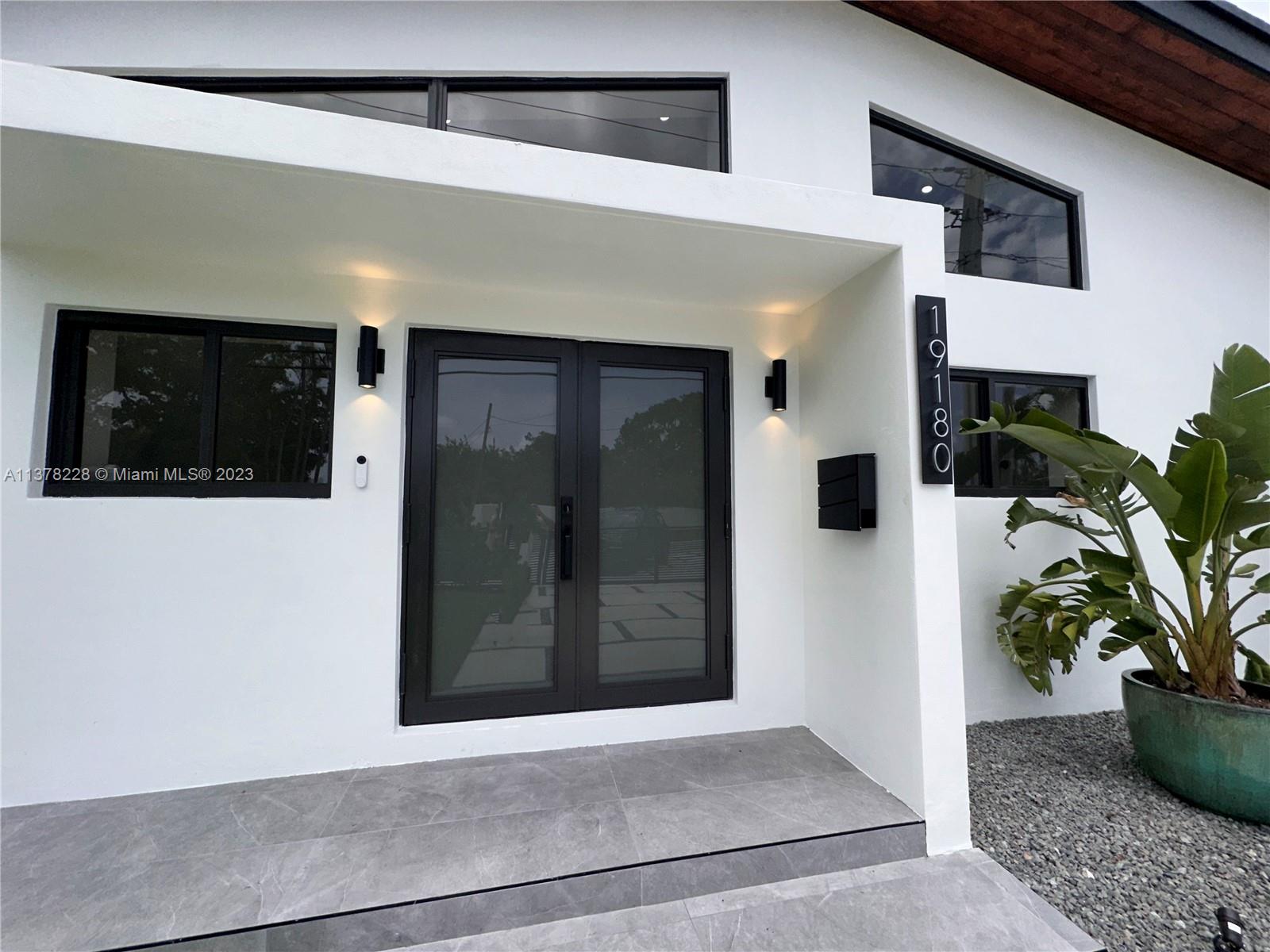 a view of a entryway door front of house