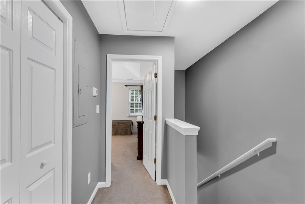 1791 Heights Circle Kennesaw, GA 30152 - Photo 18 of 24 a view of a hallway with closet and front door