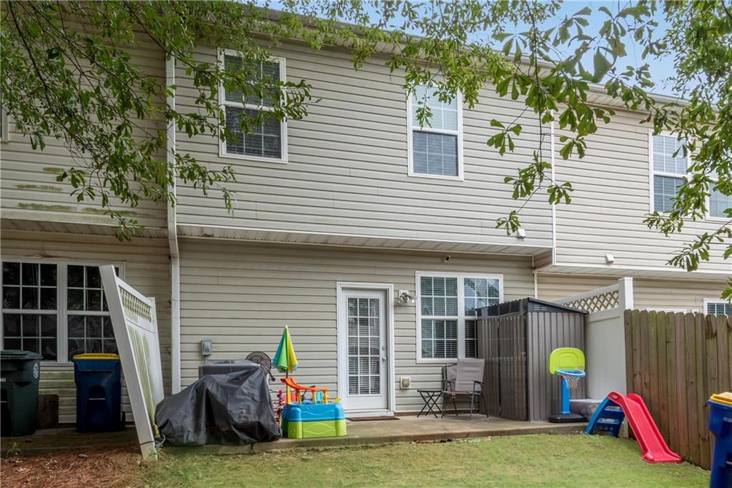 1791 Heights Circle Kennesaw, GA 30152 - Photo 24 of 24 a view of a house with a backyard