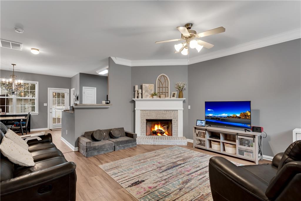 1791 Heights Circle Kennesaw, GA 30152 - Photo 4 of 24 a living room with furniture and a fireplace