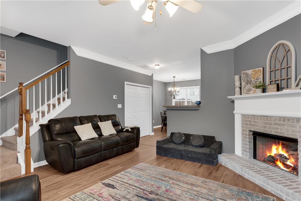 1791 Heights Circle Kennesaw, GA 30152 - Photo 6 of 24 a living room with furniture and a fireplace