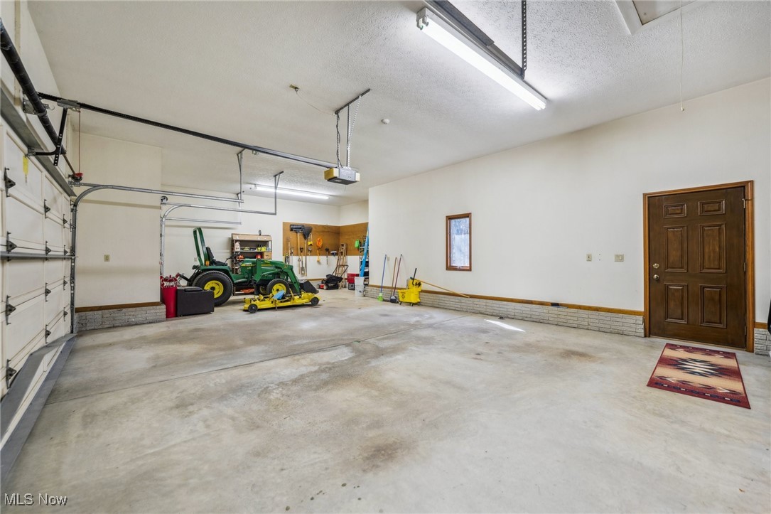 43301 Parsons Road Oberlin, OH 44074 - Photo 43 of 47 Garage with a garage door opener