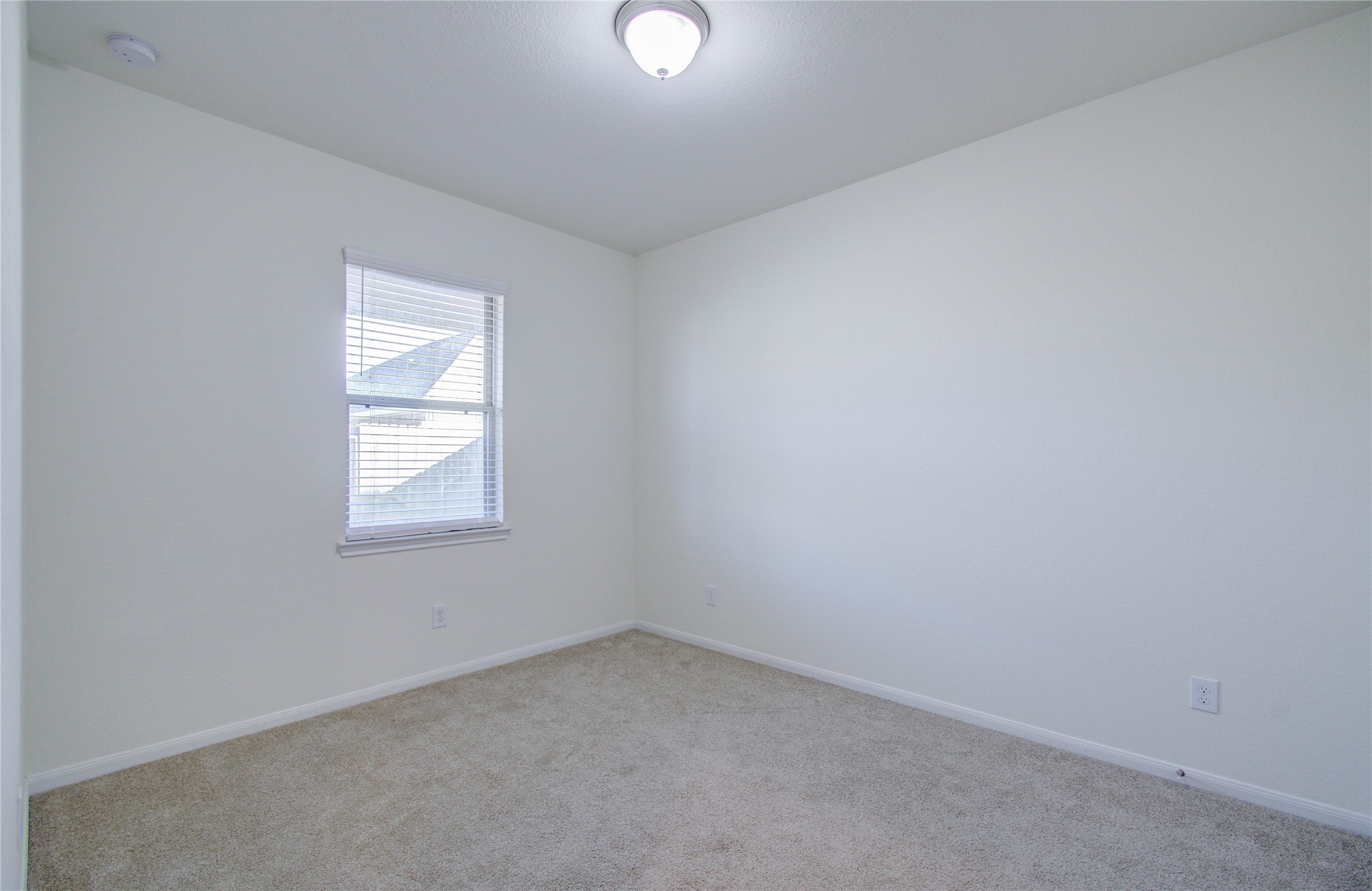 8426 Beacon Bay Circle Baytown, TX 77523 - Photo 31 of 36 an empty room with a window