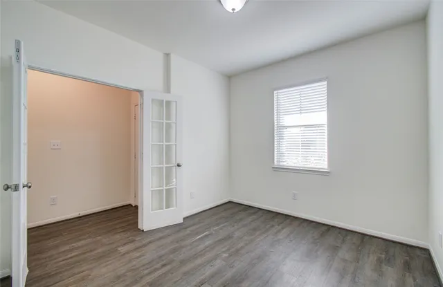 a kitchen with stainless steel appliances granite countertop a refrigerator stove and sink