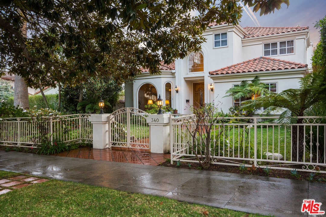 340 11th Street Santa Monica, CA 90402 - Photo 2 of 28 a front view of a house with a garden