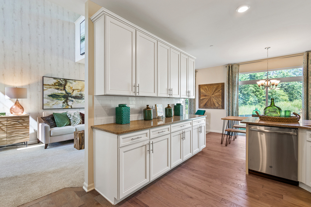 2021 Stuttle Road Batavia, IL 60510 - Photo 12 of 27 a kitchen with stainless steel appliances a white cabinets and wooden floor