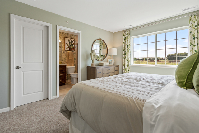 2021 Stuttle Road Batavia, IL 60510 - Photo 20 of 27 a bedroom with a bed and a large window
