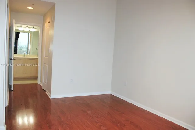 a view of city with tall buildings