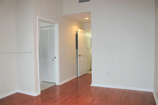 a view of a city with tall buildings