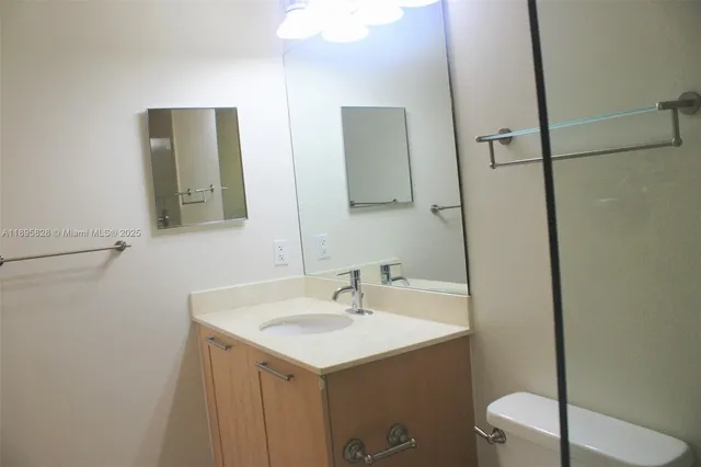 a view of a patio with couches table and chairs with potted plants