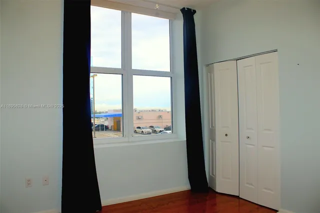 a small pool with some trees in the background