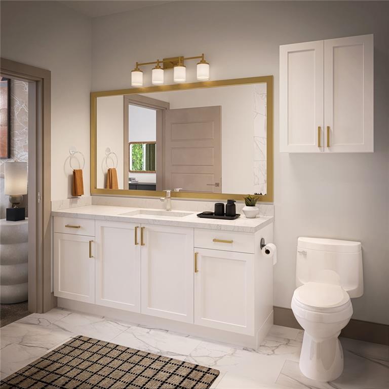 7260 Roswell Road, Unit S1 Sandy Springs, GA 30328 - Photo 7 of 23 a bathroom with a sink a toilet and a mirror