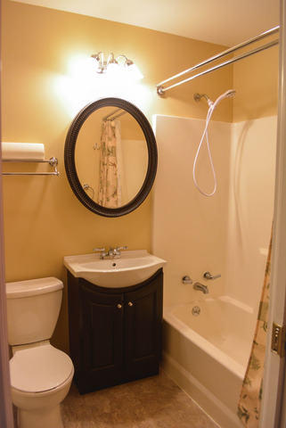 53 Sierra Road Montgomery, IL 60538 - Photo 12 of 25 a bathroom with a sink and a mirror