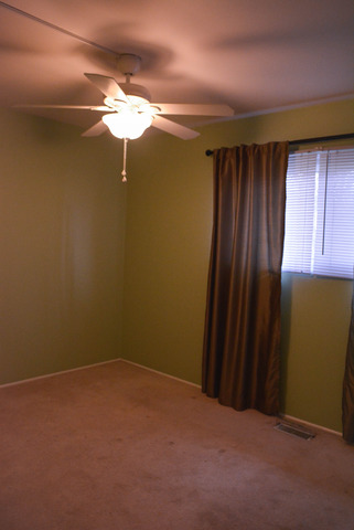 53 Sierra Road Montgomery, IL 60538 - Photo 13 of 25 a view of a livingroom with a chandelier fan