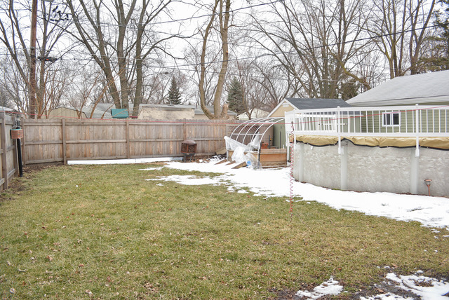 53 Sierra Road Montgomery, IL 60538 - Photo 22 of 25 a view of a house with a yard