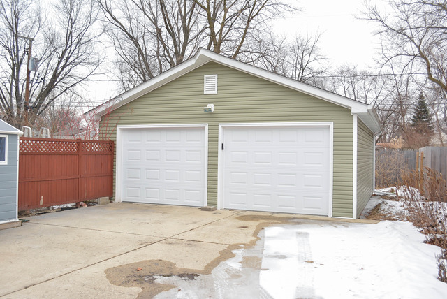53 Sierra Road Montgomery, IL 60538 - Photo 25 of 25 a small white house with a outdoor space