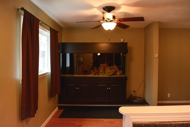 53 Sierra Road Montgomery, IL 60538 - Photo 8 of 25 a view of room with a chandelier fan and wooden floor