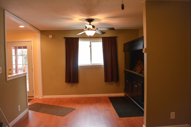 53 Sierra Road Montgomery, IL 60538 - Photo 9 of 25 a view of an empty room with window and wooden floor