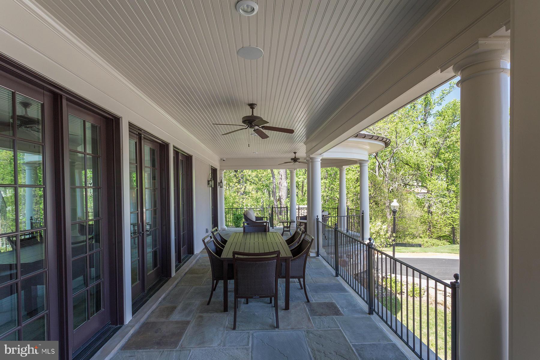 1909 Foxview Circle Northwest Washington, DC 20007 - Photo 27 of 30 a view of a porch with furniture and yard