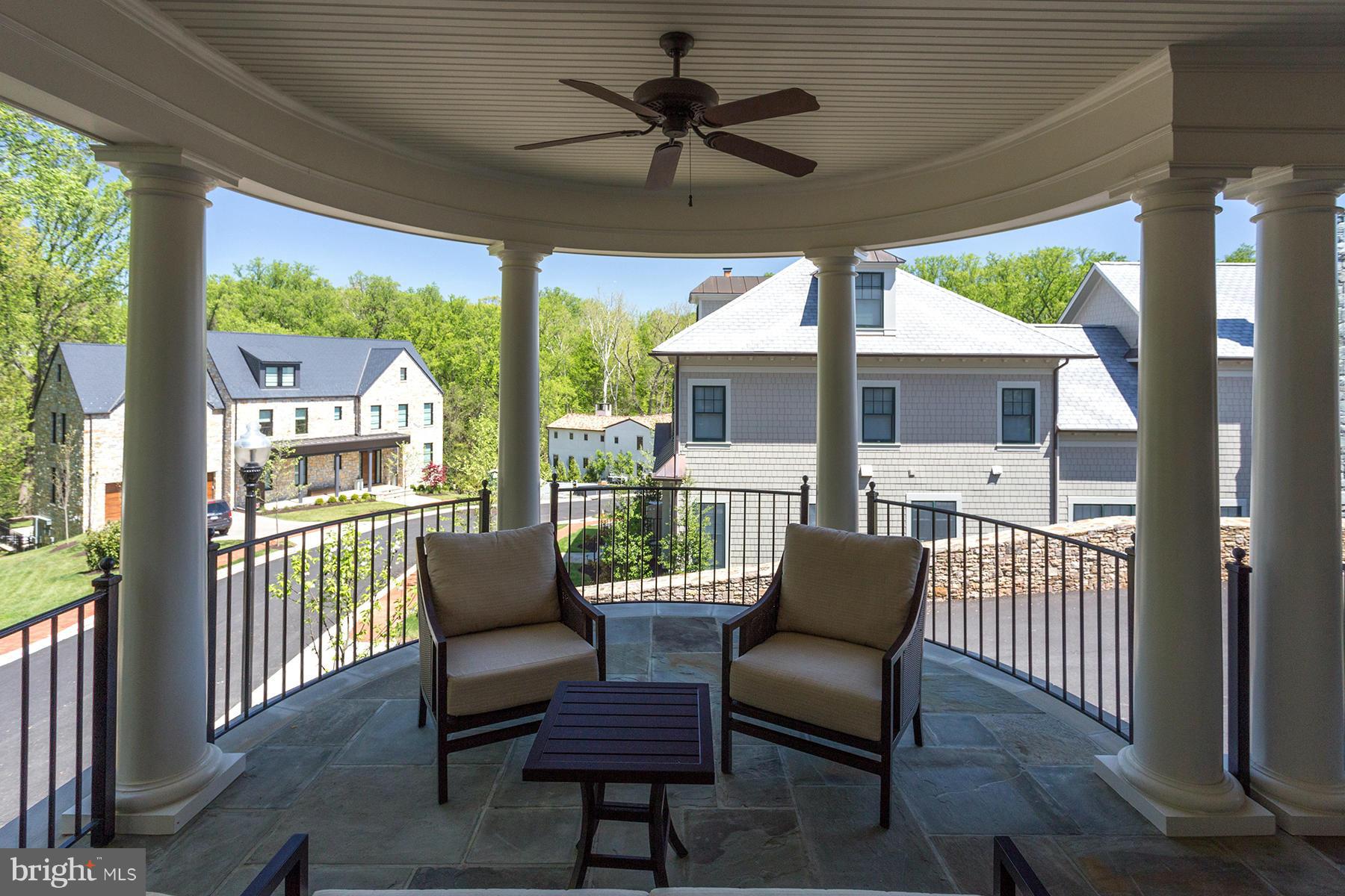 1909 Foxview Circle Northwest Washington, DC 20007 - Photo 28 of 30 a view of a patio with a table and chairs