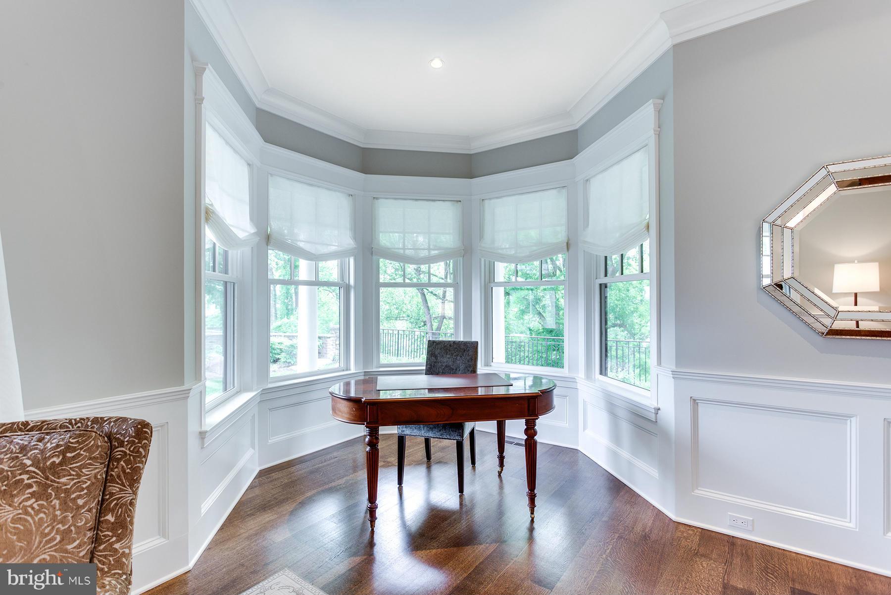 1909 Foxview Circle Northwest Washington, DC 20007 - Photo 5 of 30 a view of a dining room with furniture window and wooden floor