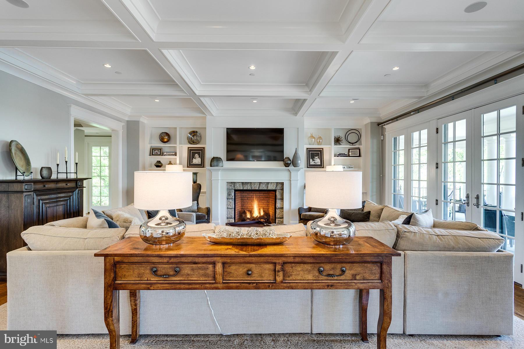 1909 Foxview Circle Northwest Washington, DC 20007 - Photo 9 of 30 a living room with furniture fireplace and flat screen tv