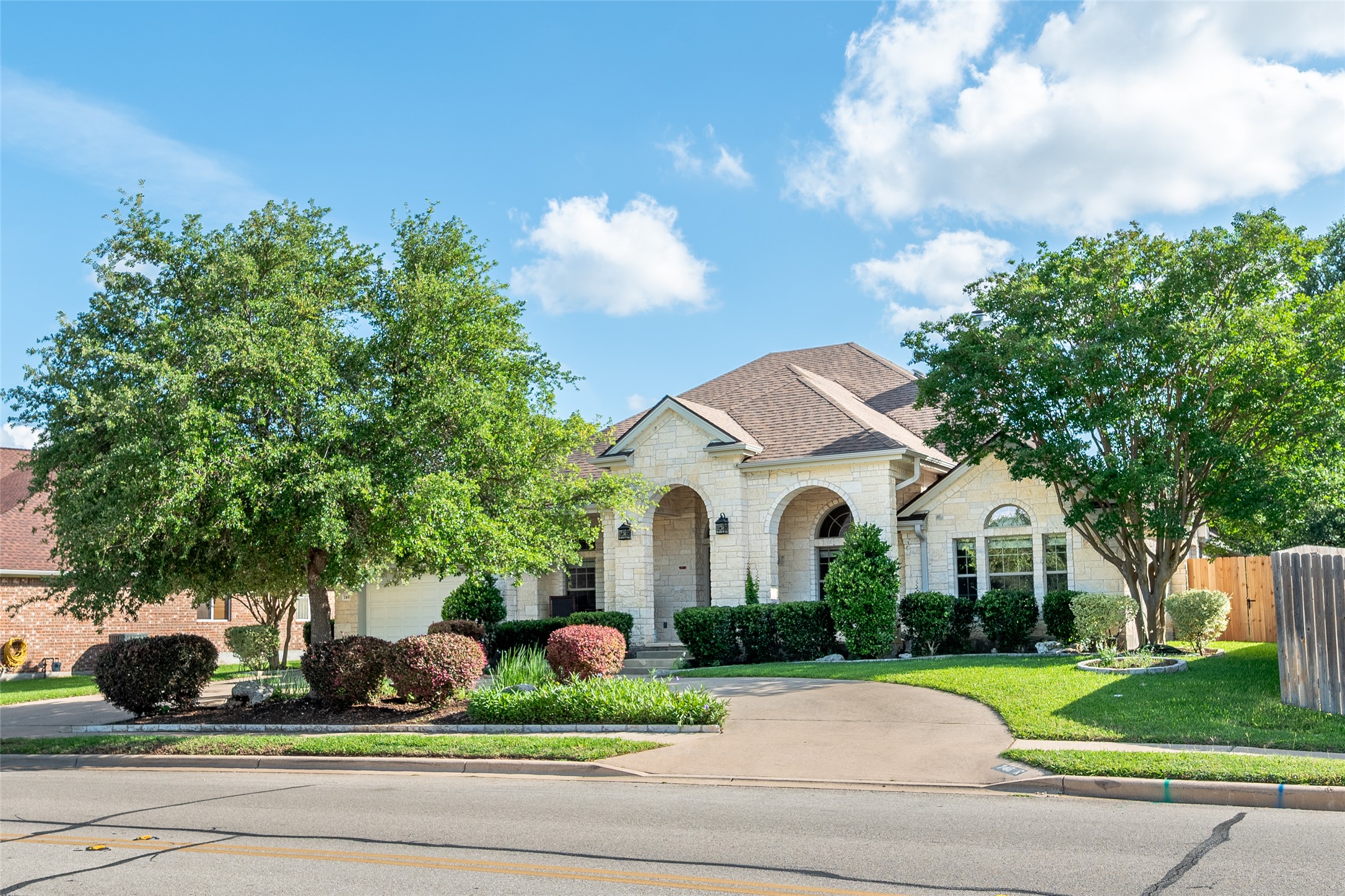 748 Nelson Ranch Road Cedar Park, TX 78613 - Photo 1 of 24 a white house with a big yard plants and large trees