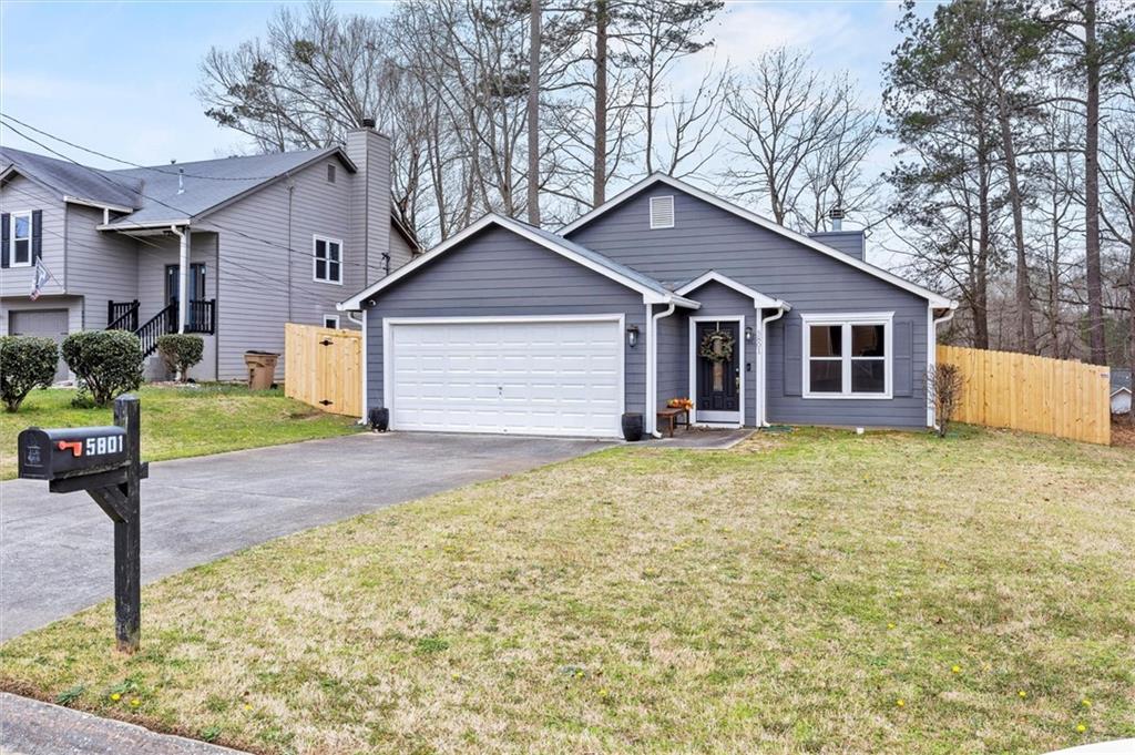 a house with trees in the background