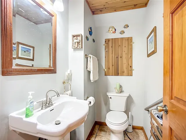 a view of bathroom with dual sinks