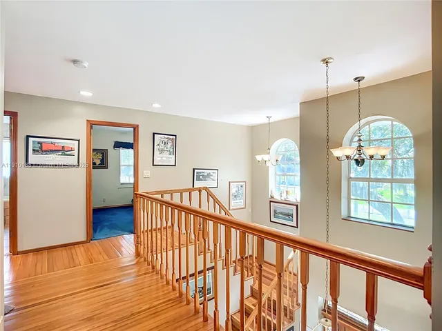 a bedroom with furniture and windows