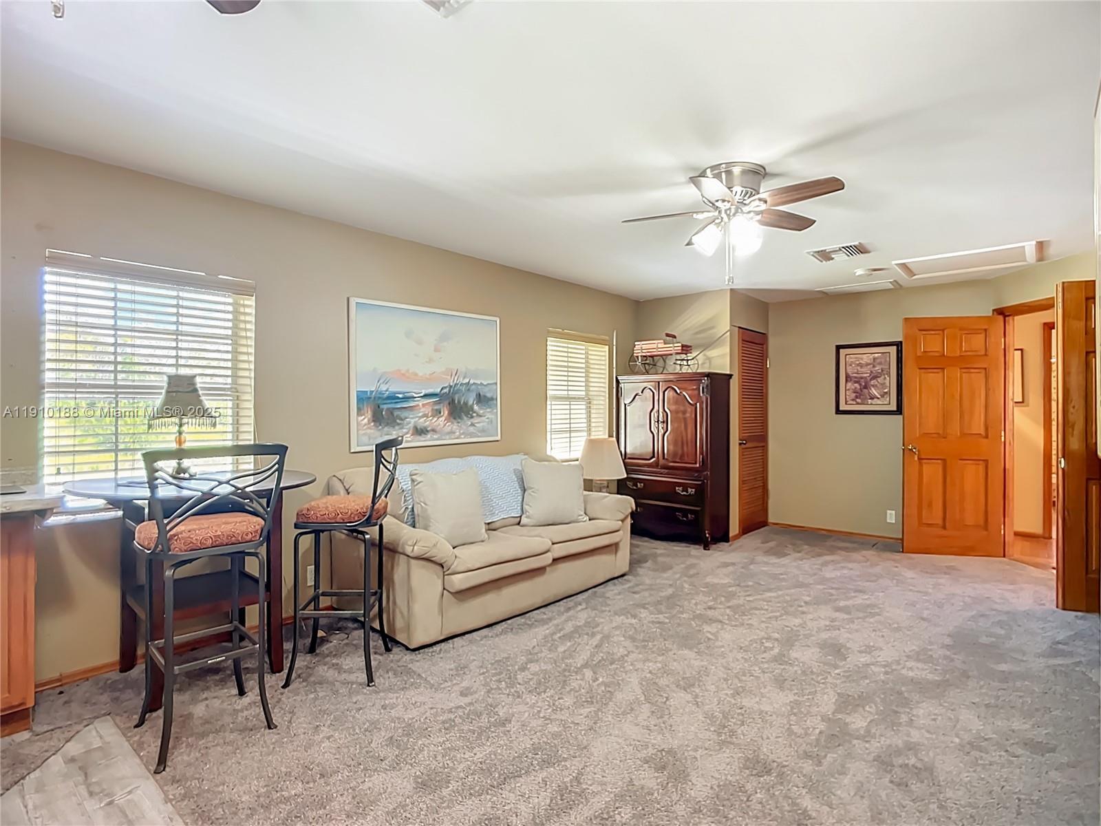 3144 Shell Lane LaBelle, FL 33935 - Photo 31 of 69 a living room with furniture and a ceiling fan