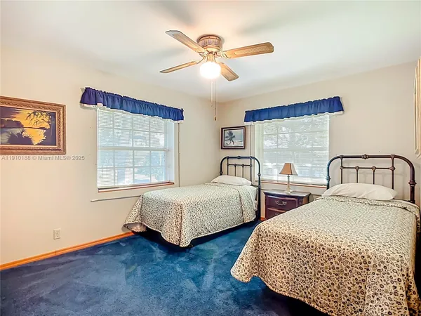 a view of parking garage with cars