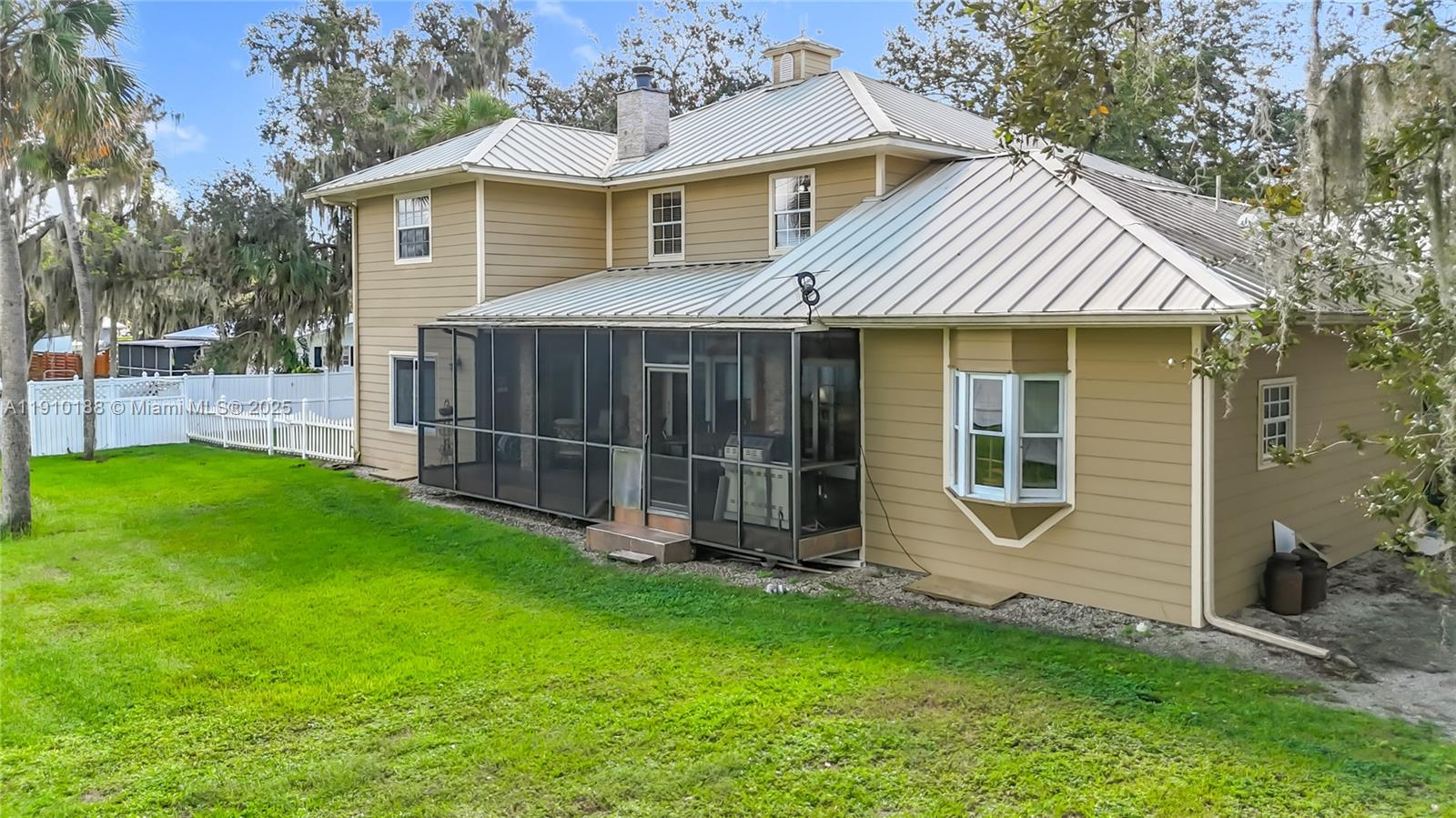 3144 Shell Lane LaBelle, FL 33935 - Photo 60 of 69 a view of a house with a garden