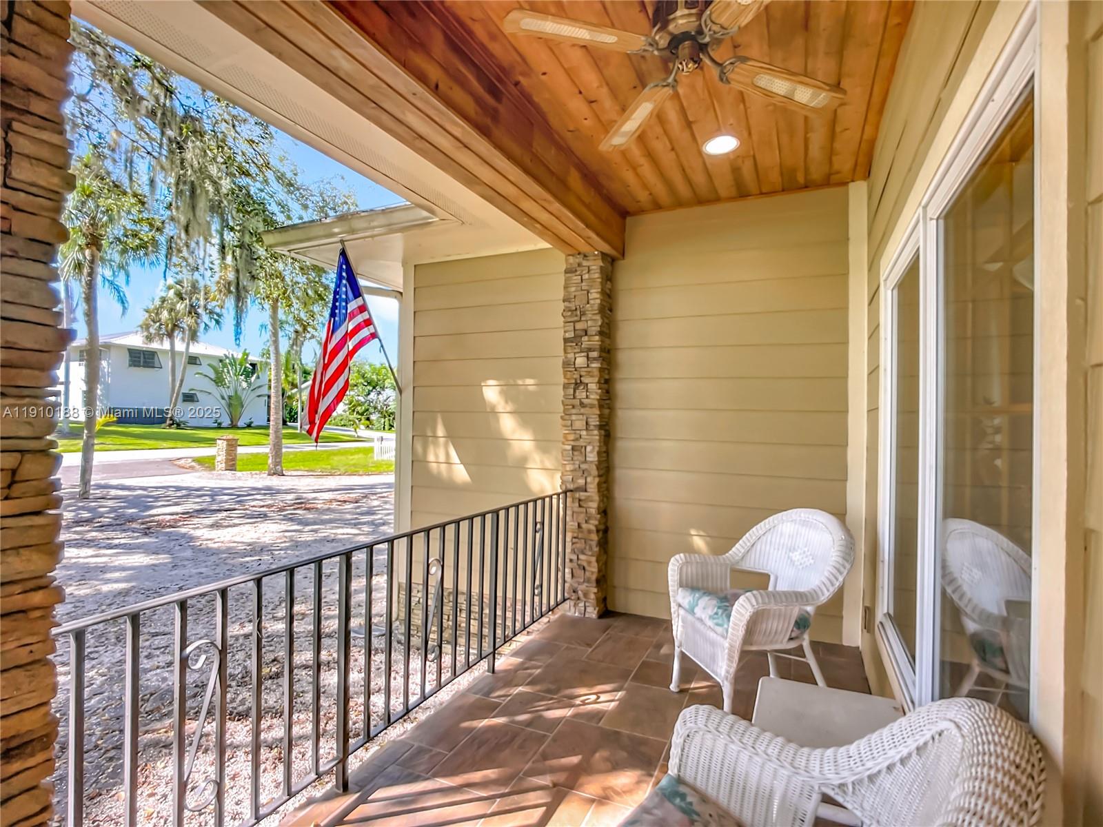 3144 Shell Lane LaBelle, FL 33935 - Photo 10 of 69 a view of a porch with a table and chairs