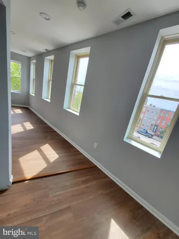 a view of an empty room and window