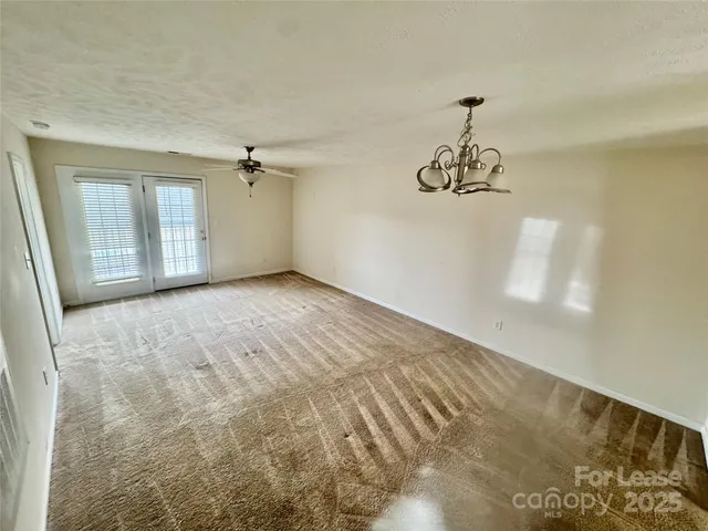 a view of a room with a window