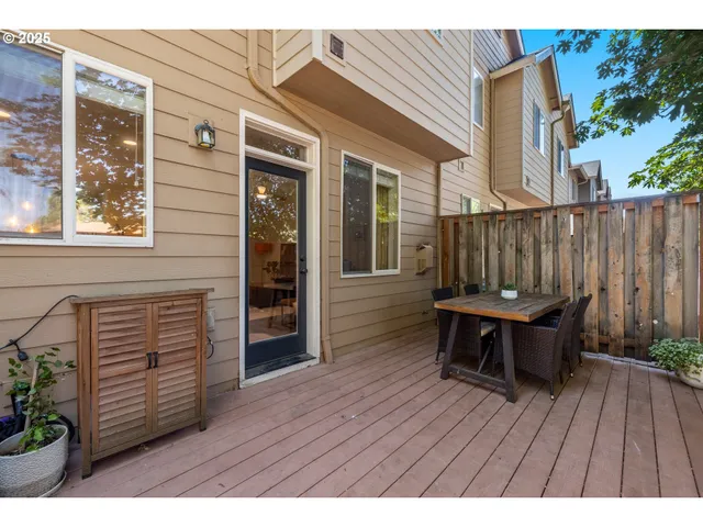 swimming pool view with a seating space