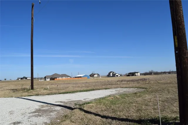 a view of ocean and a mountain