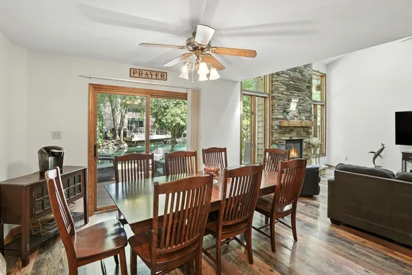 a view of a dining room with furniture window and outside view