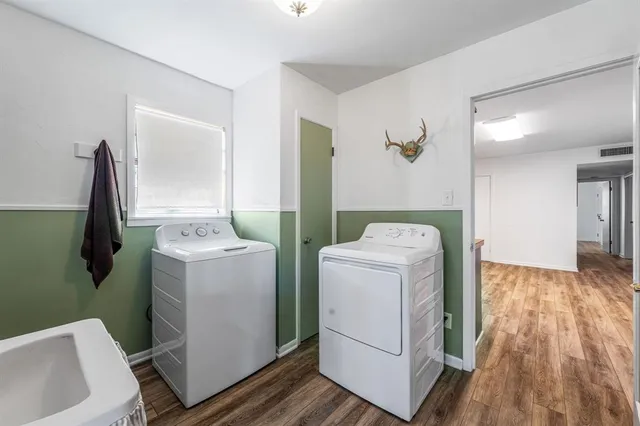 a utility room with dryer and washer